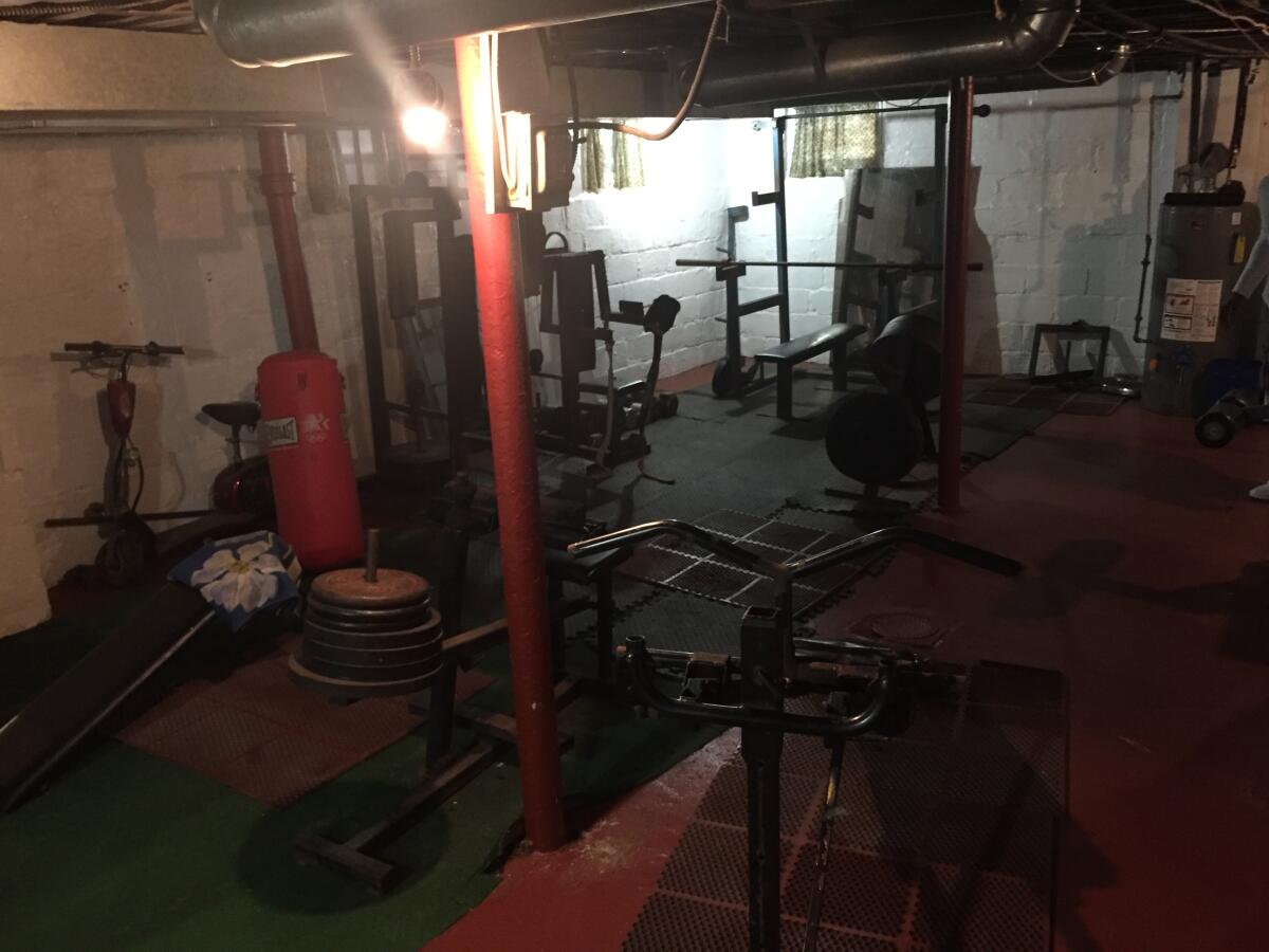 Basement gym in Aaron Donald's childhood home in Pittsburgh.