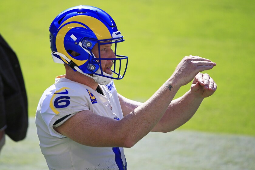 Rams punter Johnny Hekker readies to catch the football.
