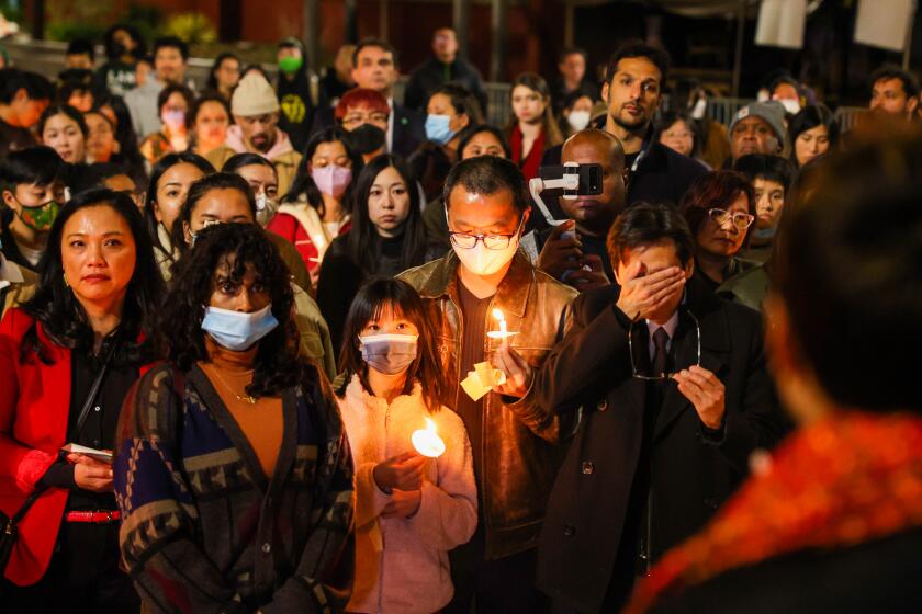 OAKLAND, CALIFORNIA - JANUARY 25: Members of the community gather during a candlelight vigil in honor to the mass shooting victims of the Monterey Park, Half Moon Bay and Oakland and remember the latest victims of gun violence at Wilma Chan Park in Oakland, Calif., on Wednesday, Jan. 25, 2023. The event was organized by Asian Americans and Pacific Islanders for Civic Empowerment Education Fund. (Photo by Ray Chavez/MediaNews Group/The Mercury News via Getty Images)