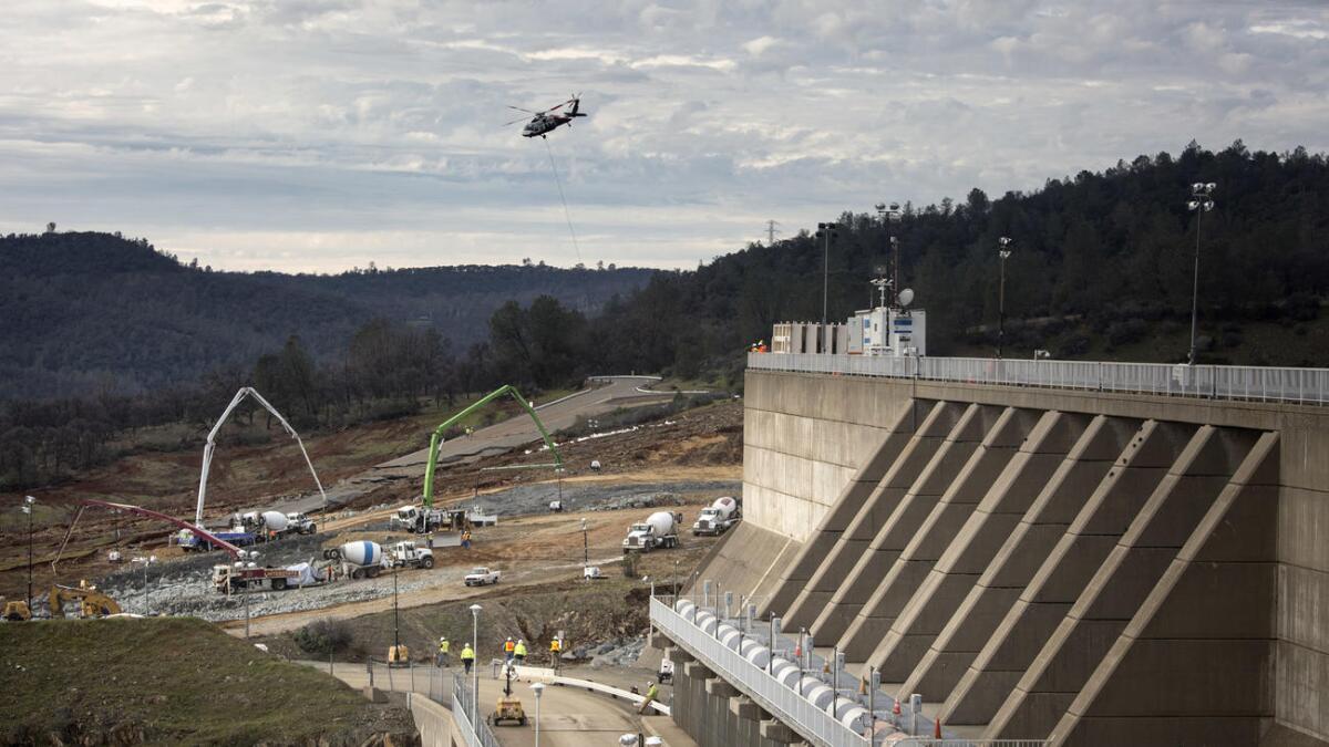 Spillway repairs continue at Oroville Dam on Wednesday.