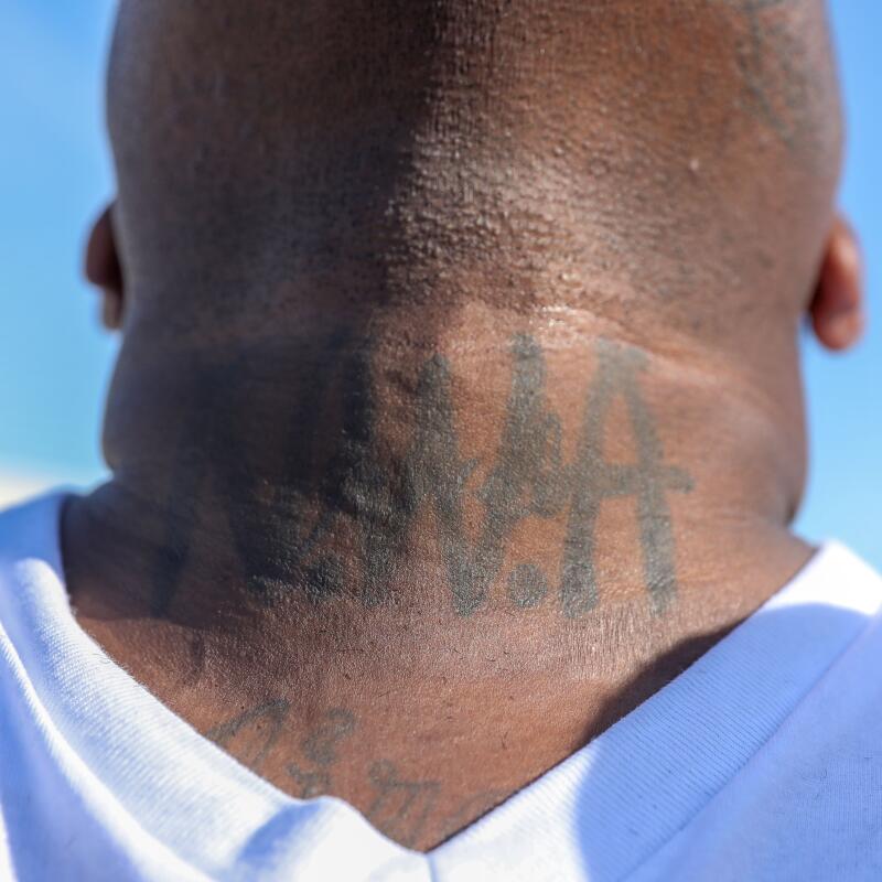 An attendee at Wednesday's ceremony shows his N.W.A tattoo.
