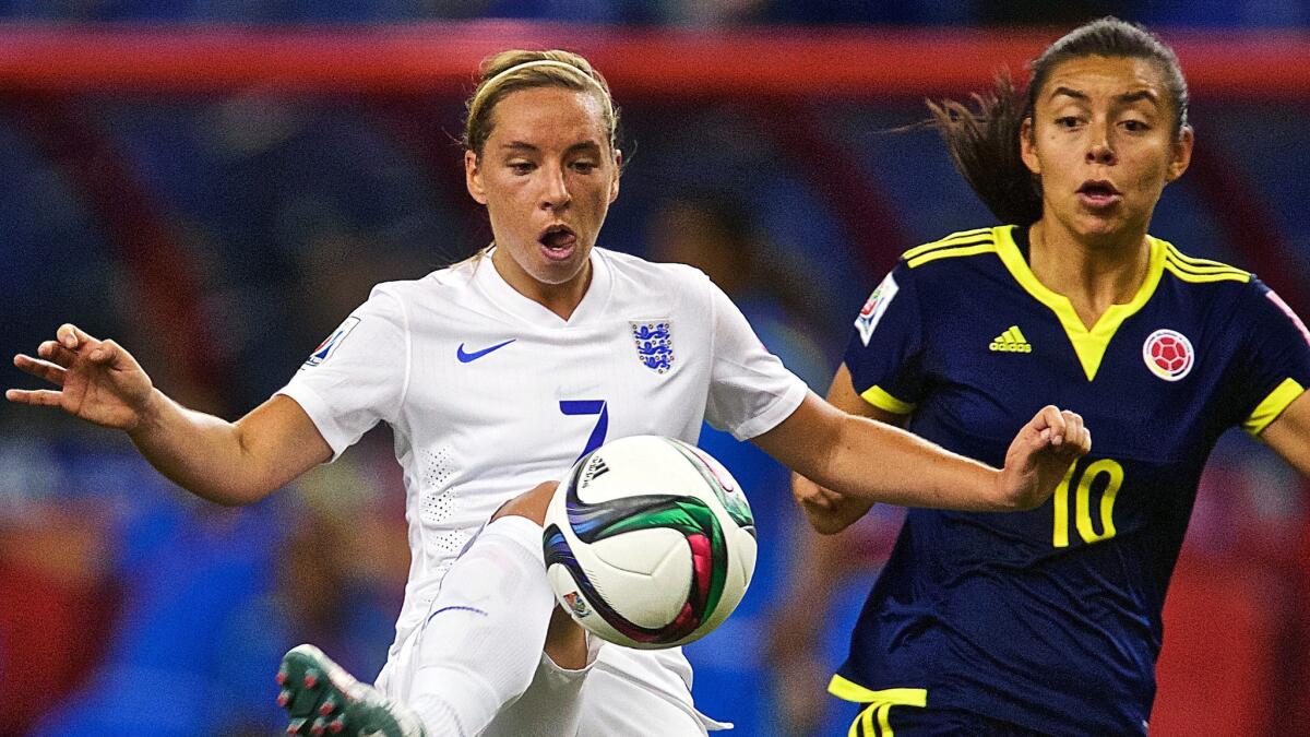 England's Jordan Nobbs, left, battles Colombia's Yoreli Rincon for the ball during a Group F match at the women's World Cup in Montreal, Canada, on Wednesday.