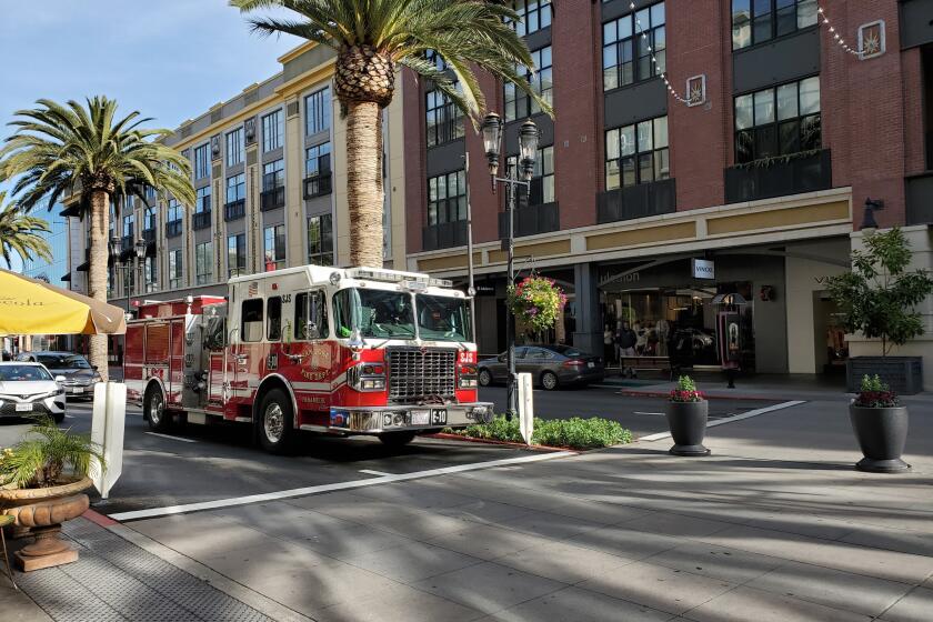 San Jose Fire Department fire engine drives down Santana Row in the Silicon Valley, San Jose, California, January 3, 2020. (Photo by Smith Collection/Gado/Getty Images)
