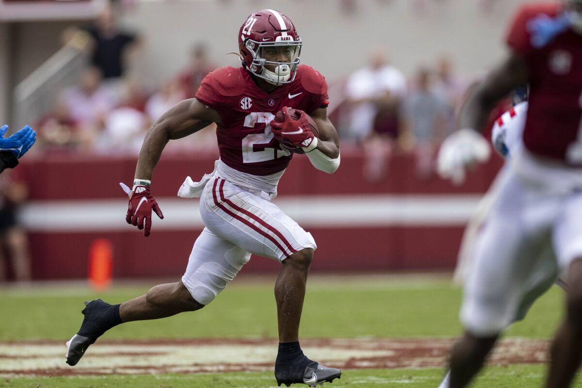 Alabama running back Jase McClellan (21) runs the ball against Mississippi during the second half of an NCAA college football game, Saturday, Oct. 2, 2021, in Tuscaloosa, Ala. (AP Photo/Vasha Hunt)