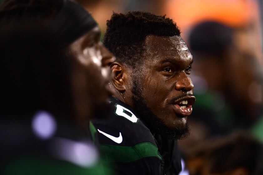EAST RUTHERFORD, NEW JERSEY - SEPTEMBER 16: Kelechi Osemele #70 of the New York Jets sits on the sidelines during their game against the Cleveland Browns at MetLife Stadium on September 16, 2019 in East Rutherford, New Jersey. (Photo by Emilee Chinn/Getty Images)