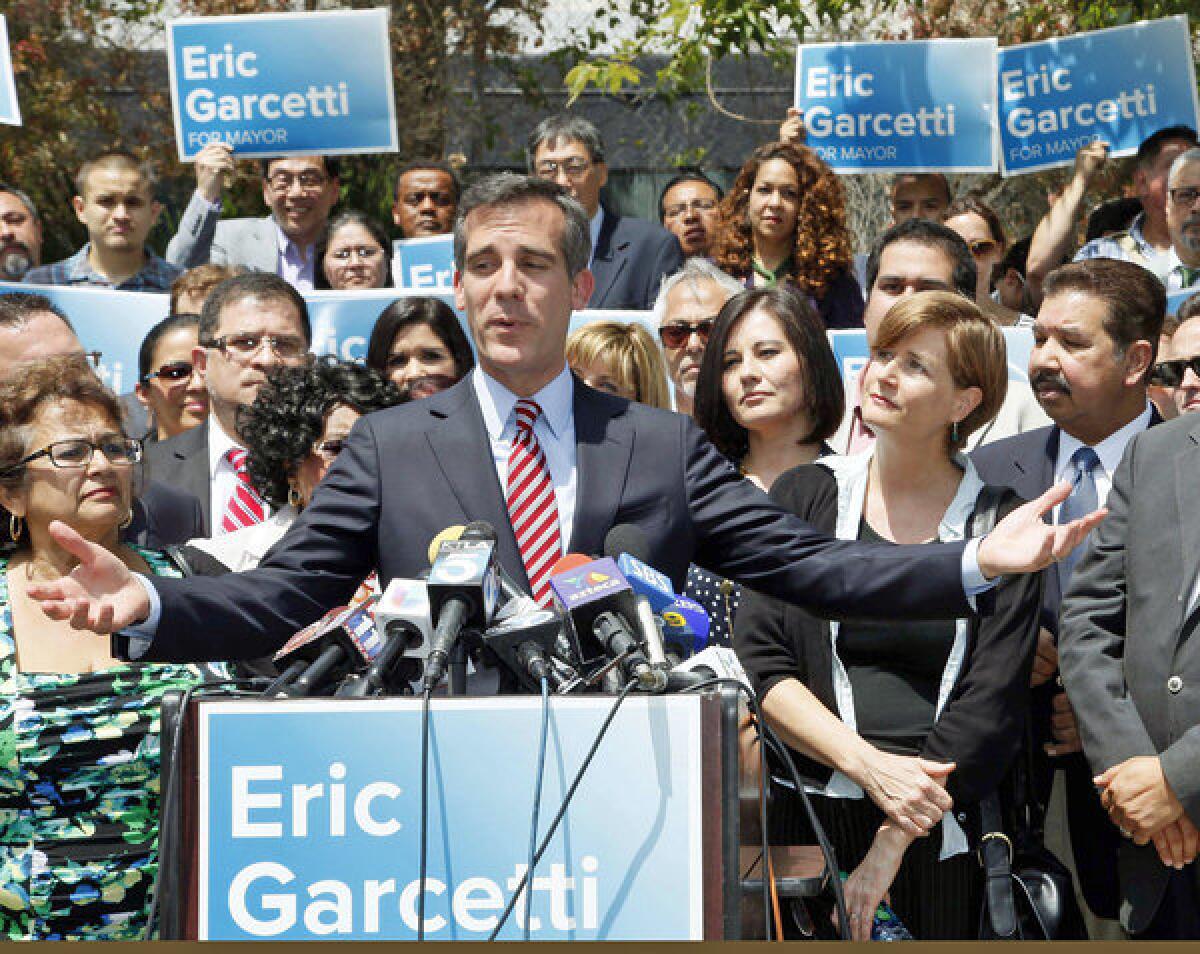 Los Angeles Mayor-elect Eric Garcetti speaks at a news conference. Garcetti says he's going to focus like a "laser beam" on the economy when he takes office July 1.