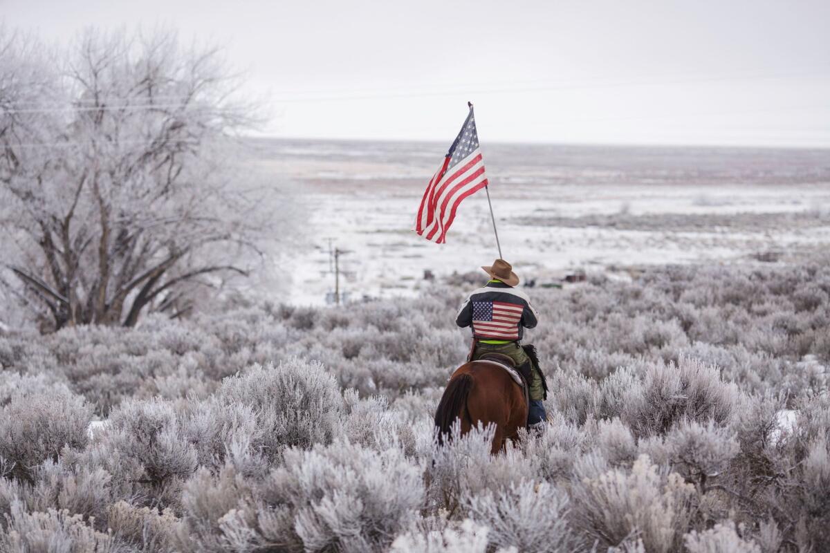 Duane Ehmer rides his horse at Malheur National Wildlife Refuge on Jan. 7, the sixth day of the occupation outside Burns, Ore.