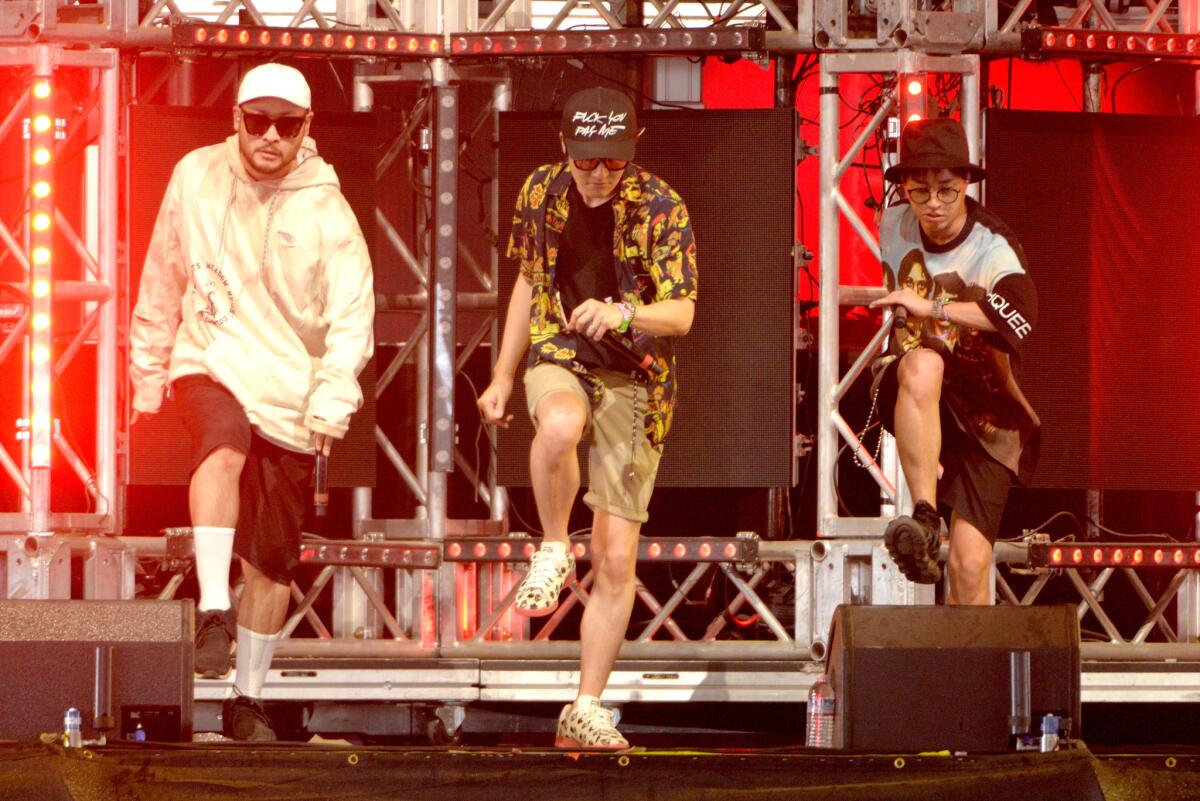 Members of Epik High perform onstage during Day 3 of the 2016 Coachella Valley Music and Arts Festival during the first weekend.