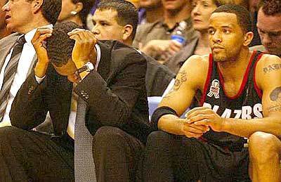 Coach Maurice Cheeks, with Damon Stoudamire, has had his patience tested by the Jail Blazer circus.