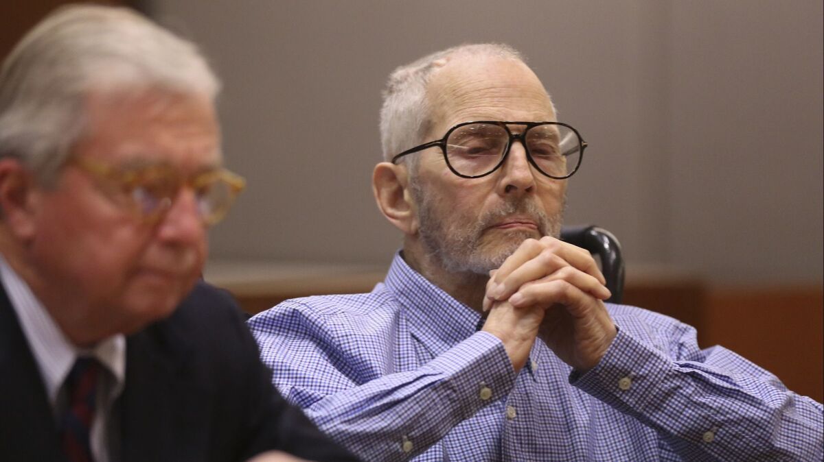 New York real estate magnate Robert Durst, right, shown at an earlier hearing, appeared in court Thursday for a pretrial hearing.