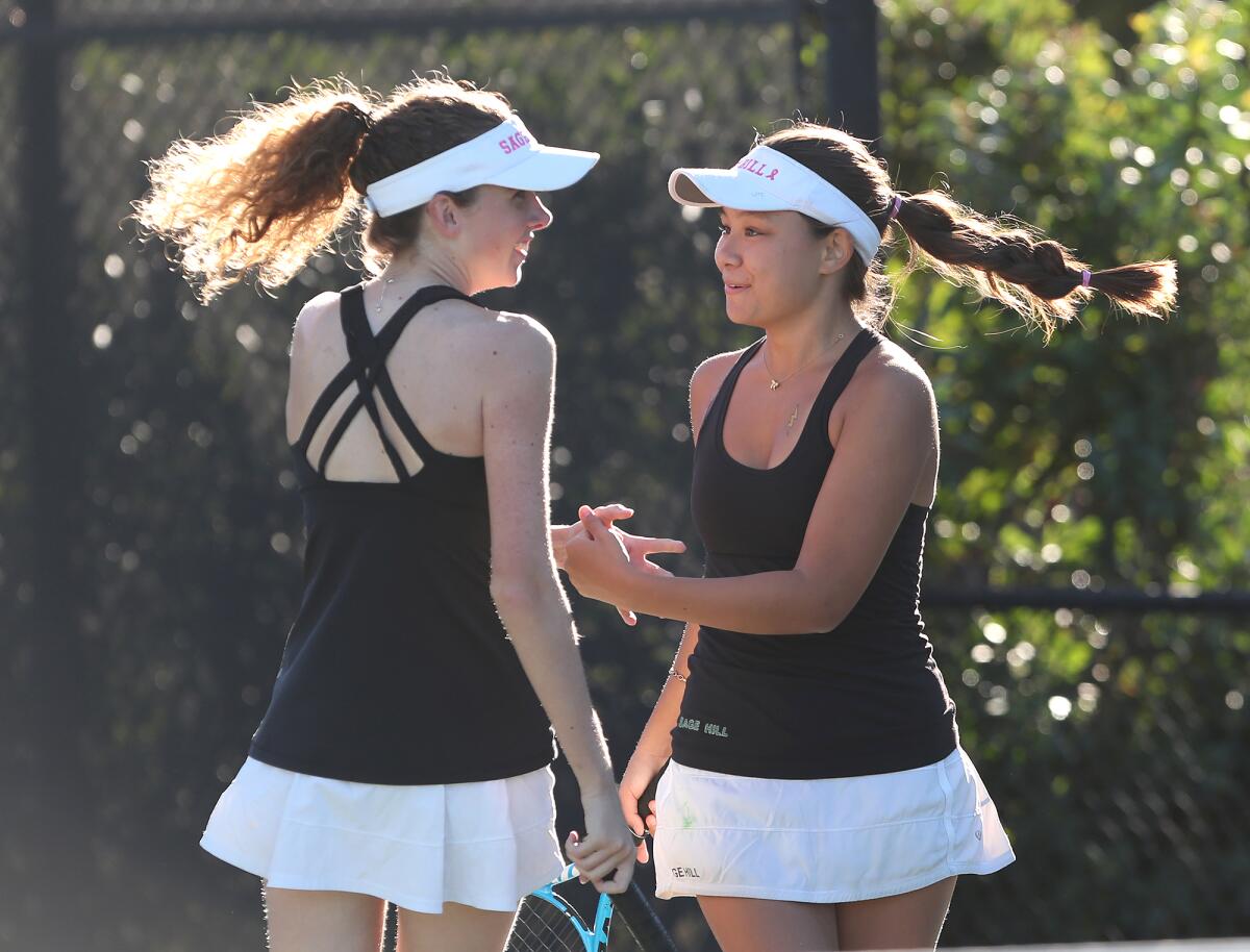 Sage Hill doubles players Ava Herin and Kana Byrd, from left, celebrate winning their first match in the CIF semifinals.
