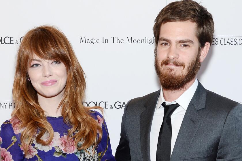 Emma Stone and Andrew Garfield are photographed at the premiere of "Magic in the Moonlight" in New York on July 17, 2014.