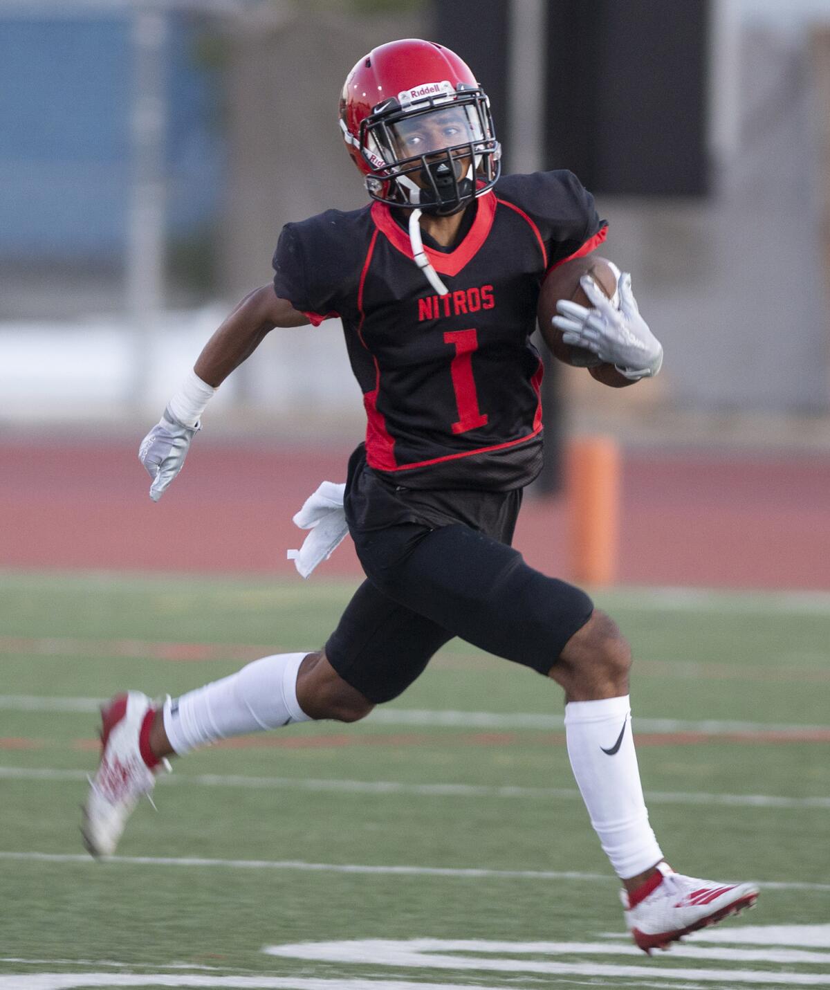 Glendale's Josh Tomihara runs the ball for a gain during Friday's game against Mendez at Glendale High School. (Photo by Miguel Vasconcellos)