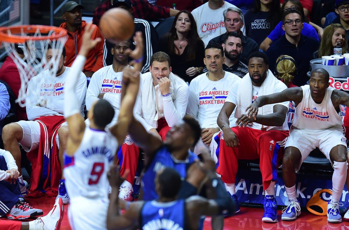 Clippers forwards Blake Griffin, Matt Barnes, DeAndre Jordan and guard Jamaal Crawford sit on the bench earlier this month. Key players could sit more with seven games in 10 days.