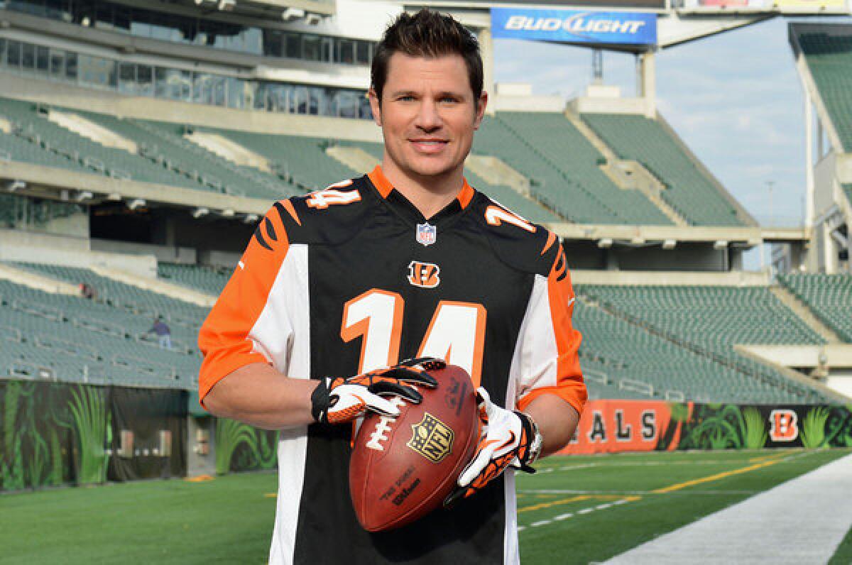 Nick Lachey visits Paul Brown Stadium, home of the Cincinnati Bengals, to promote Tide's "Show Us Your Colors" campaign.