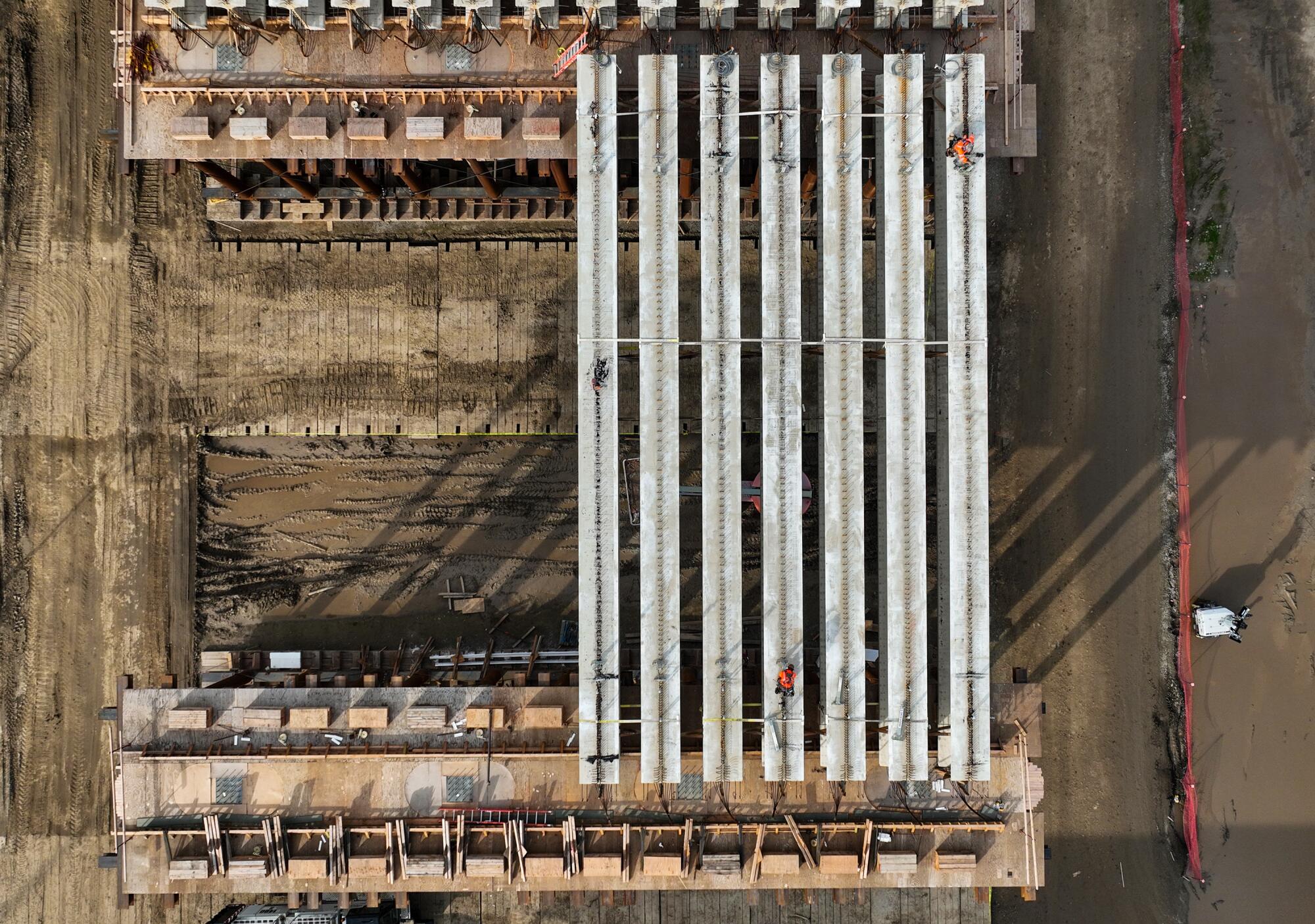 An aerial view of construction of a high-speed rail viaduct.