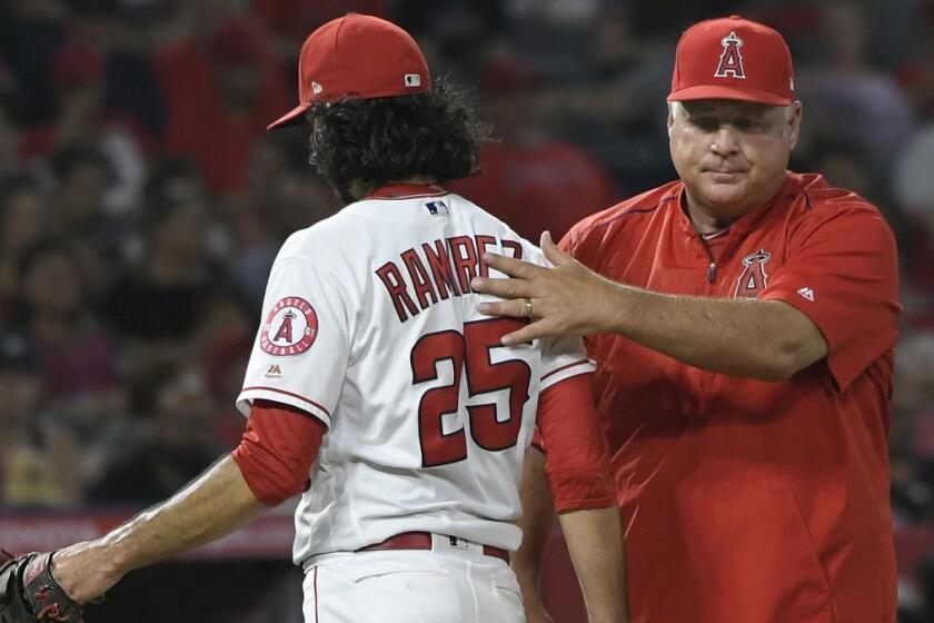 ANAHEIM, CA - AUGUST 06: Noe Ramirez #25 of the Los Angeles Angels of Anaheim is pulled from the game by manager Mike Scioscia in the sixth inning against the Detroit Tigers at Angel Stadium on August 6, 2018 in Anaheim, California. (Photo by John McCoy/Getty Images) ** OUTS - ELSENT, FPG, CM - OUTS * NM, PH, VA if sourced by CT, LA or MoD **