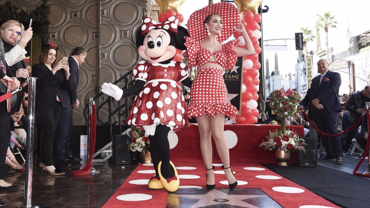 Minnie Mouse and Katy Perry step out at a ceremony honoring Minnie's star on the Hollywood Walk of Fame.