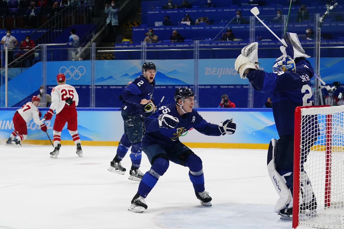 Hockey players rejoice at the 2022 Winter Olympics.