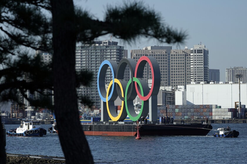 The Olympic rings on a barge in Tokyo Bay
