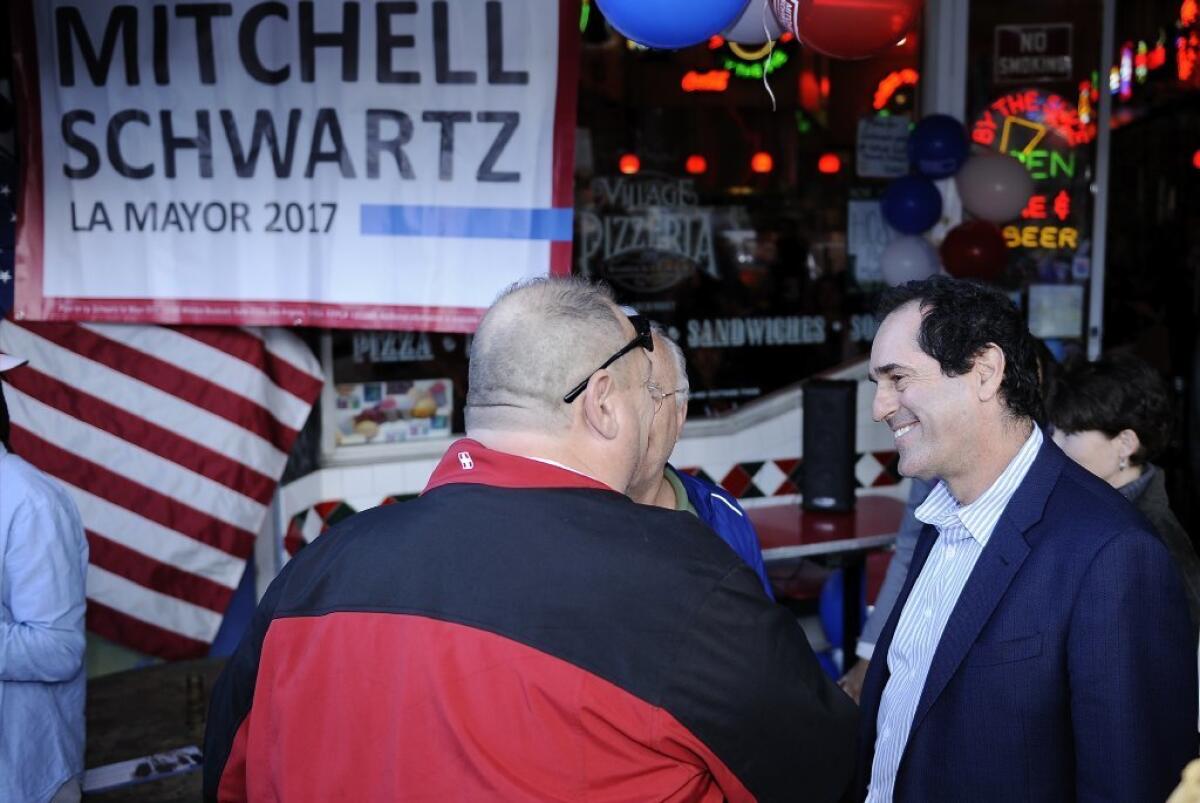 L.A. mayoral candidate Mitchell Schwartz talks to supporters at his campaign kickoff.