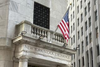 An entrance to the New York Stock Exchange is shown on Wednesday, Aug. 14, 2024, in New York. (AP Photo/Peter Morgan)