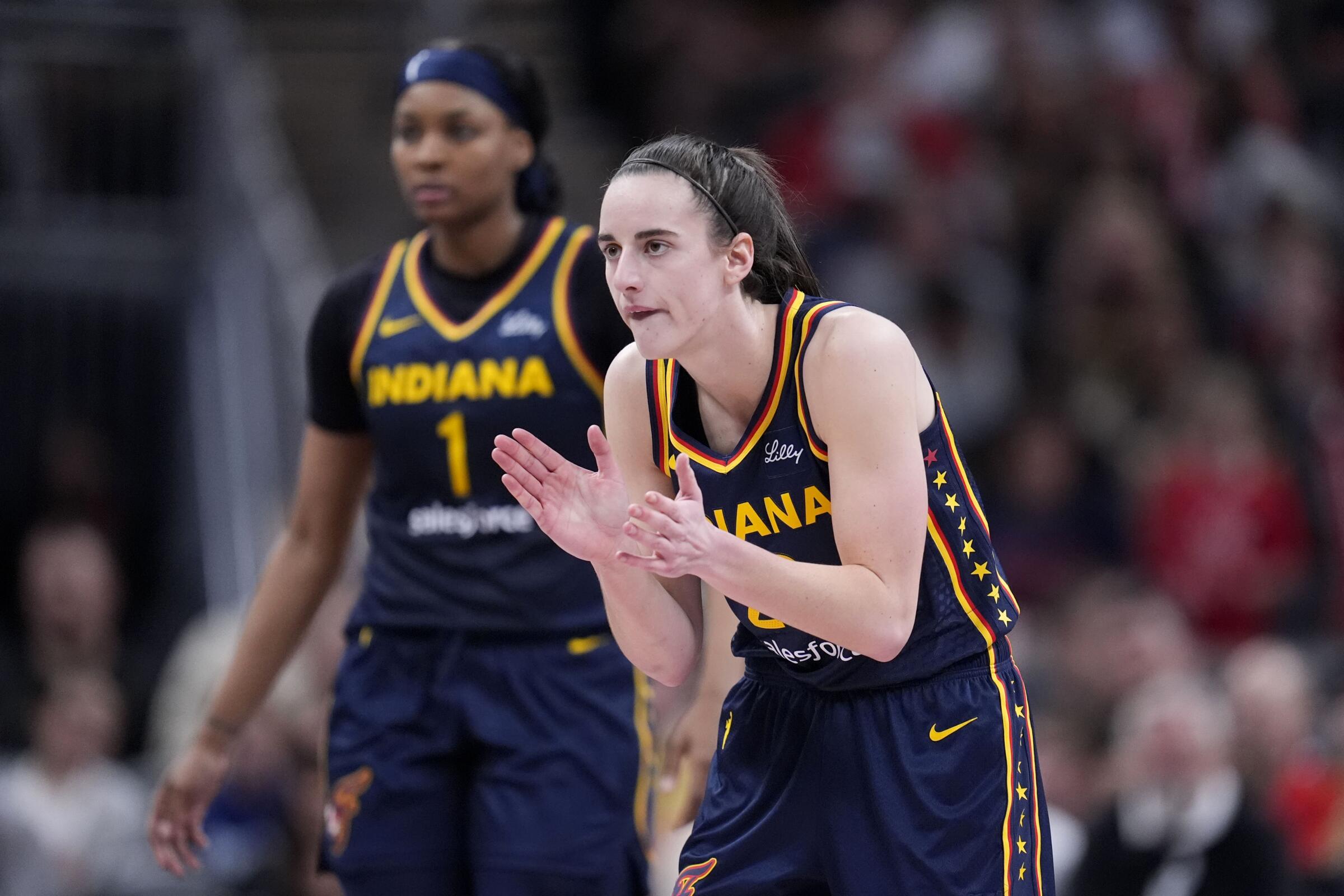 Indiana Fever guard Caitlin Clark reacts during a game against the New York Liberty on May 16.