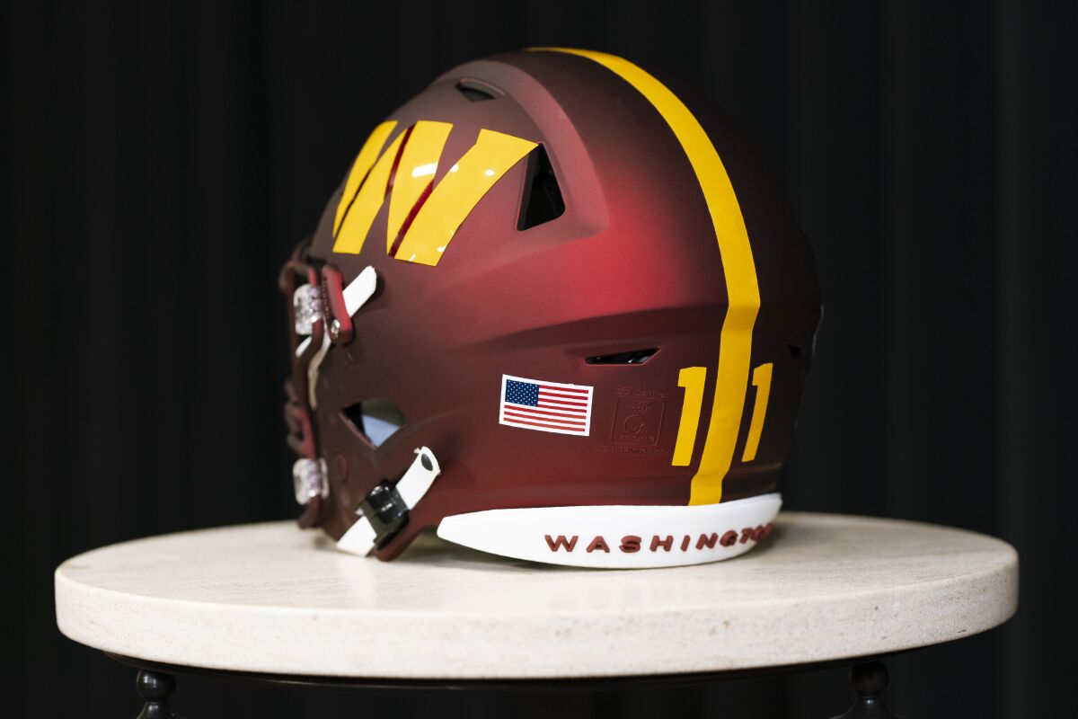 A close-up a Washington Commanders helmet