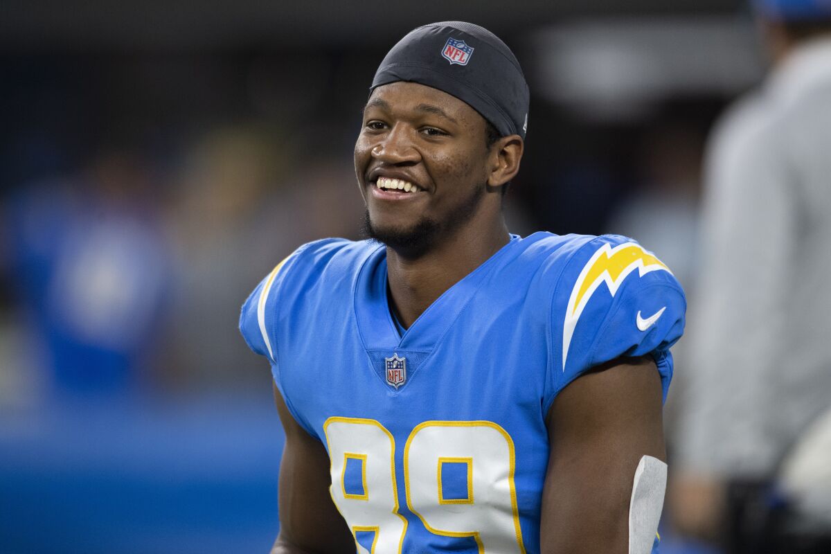 FILE - Los Angeles Chargers tight end Donald Parham (89) stretches before an NFL football game against the Kansas City Chiefs Thursday, Dec. 16, 2021, in Inglewood, Calif. Parham is participating in the offseason program and is happy to be back on the field, less than three months after he was taken off the field on a stretcher during the first quarter of a Dec. 15 game against the Kansas City Chiefs.(AP Photo/Kyusung Gong, File)