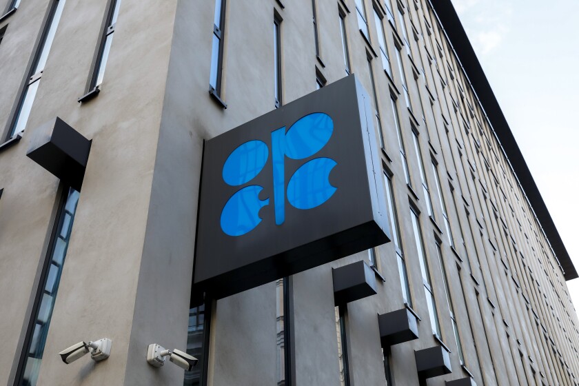FILE - The logo of the Organization of the Petroleoum Exporting Countries (OPEC) is seen outside of OPEC's headquarters in Vienna, Austria, Thursday, March 3, 2022. Oil prices are high, and drivers are paying more at the pump. But the OPEC oil cartel and allied producing nations may not be much help at their meeting Thursday, June 30. The OPEC+ alliance, which includes Russia. is having trouble meeting its announced production quotas. (AP Photo/Lisa Leutner, file)
