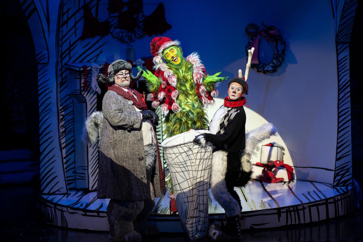 Three actors in costume from Dr. Seuss's How the Grinch Stole Christmas!