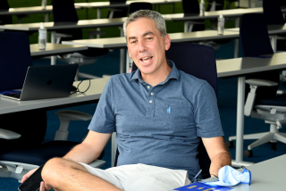 THOUSAND OAKS, CA - AUGUST 18: Kevin Demoff, Chief Operating Officer of the Los Angeles Rams, looks on during training camp.