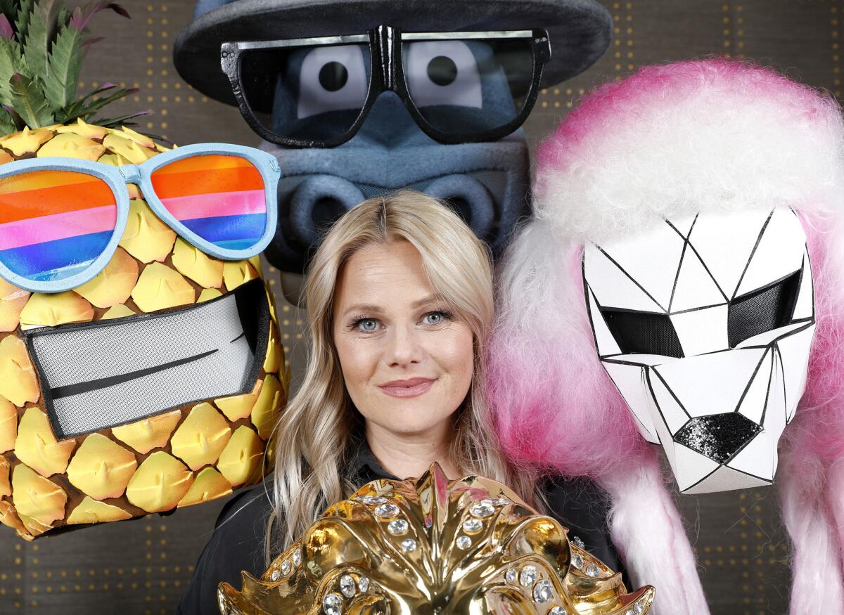 Unmasked: Marina Toybina with some of the masks she designed for "The Masked Singer."