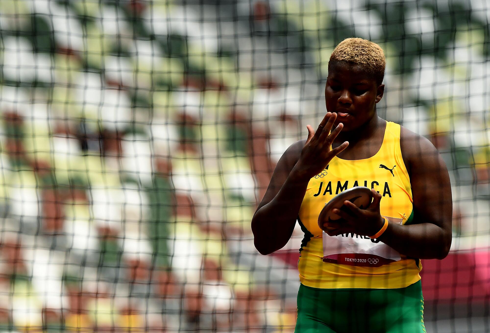 Jamaica's Shadae Lawrence prepares to make a throw in the women's discus throw qualifying.