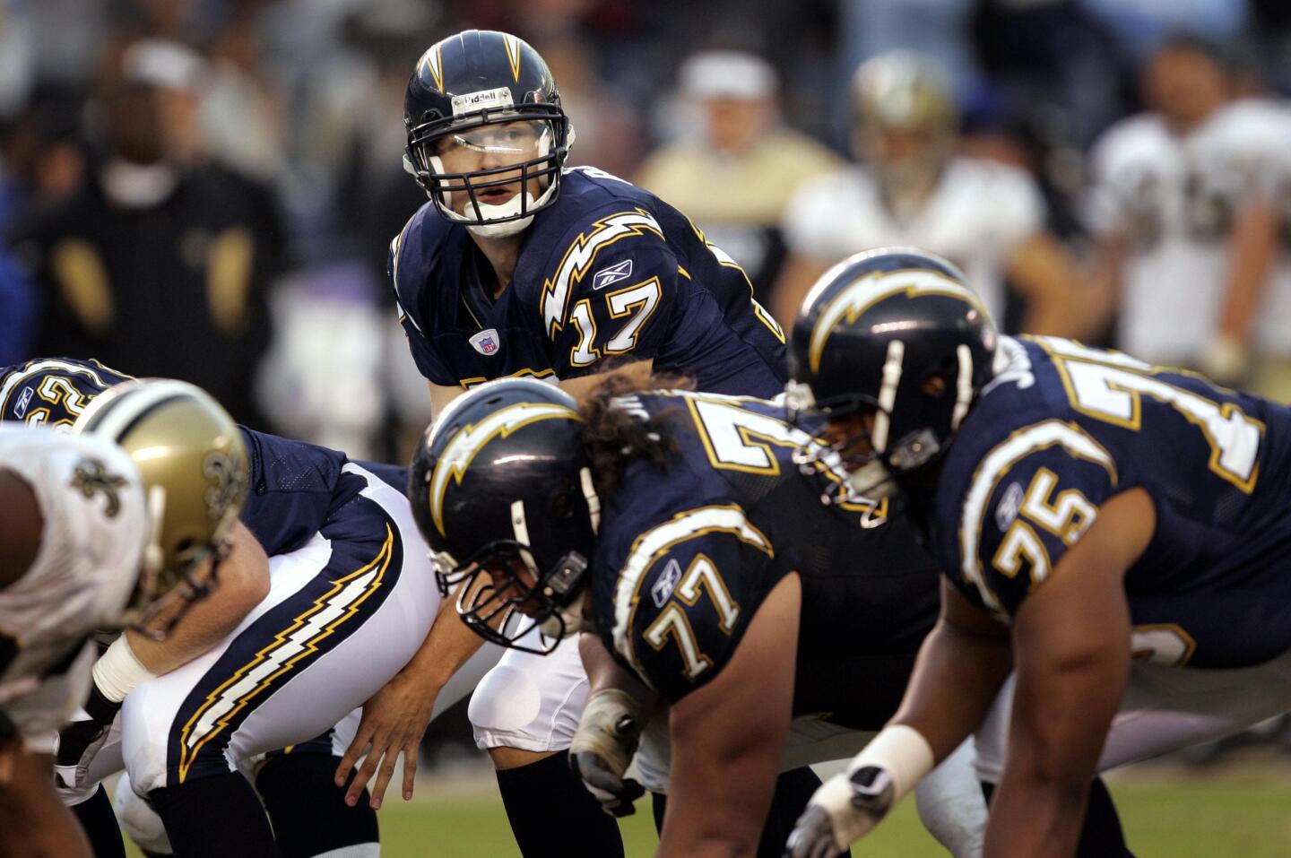 Chargers Philip Rivers takes a snap against the New Orleans Saints at Qualcomm Stadium on Nov. 7, 2004.