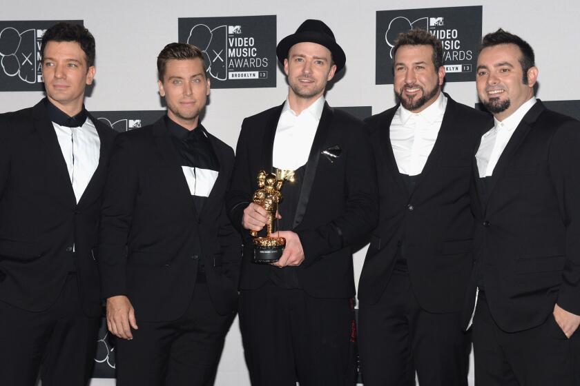 JC Chasez, left, Lance Bass, Justin Timberlake, Joey Fatone and Chris Kirkpatrick of 'N Sync were on hand in 2013 when Timberlake received MTV's Video Vanguard Award.