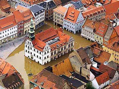 Floodwaters creep into the central square in Pirna, Germany.