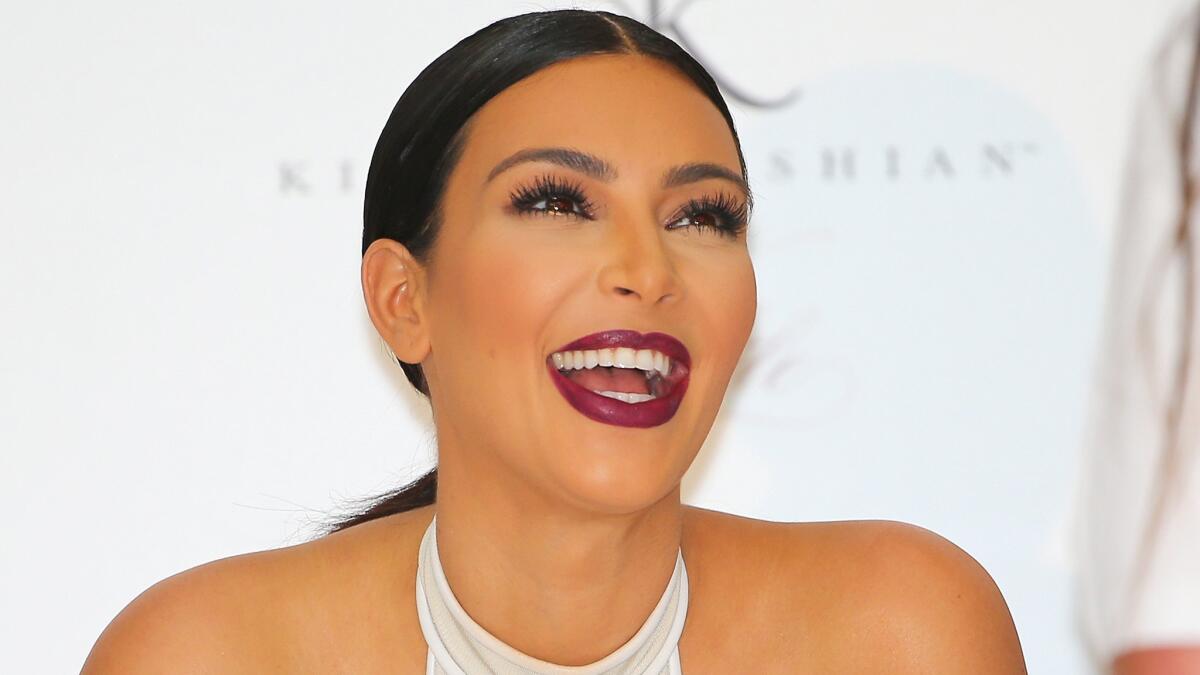 It's Kim Kardashian's Instagram -- you're just living in it. Her wedding picture is not only the most liked image on the social media site for 2014, it holds the all-time record.