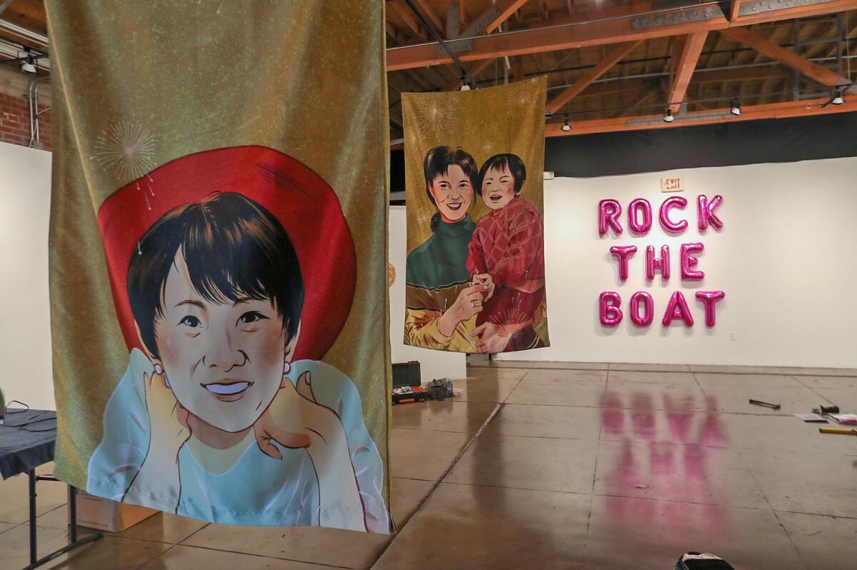 Hand-painted banners at "Yellow Submarine Rising: Currents Within Asian American Art" at O.C. Center for Contemporary Art. 