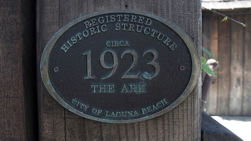 The Ark home in Laguna Beach, one of the city's many historical houses, displays this plaque. The city is revising its historic preservation ordinance to align with state and federal preservation standards.