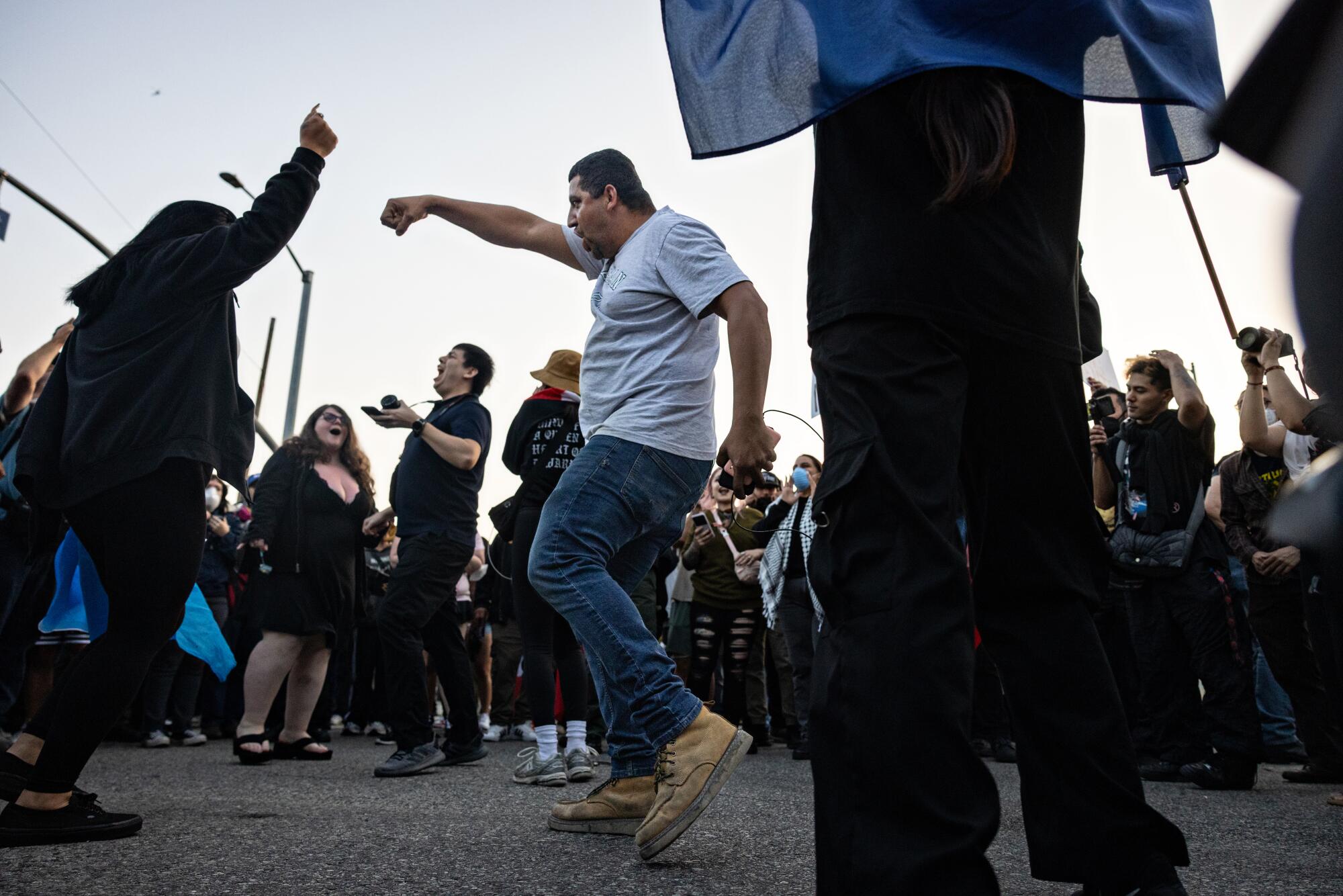 protesters dance in the street