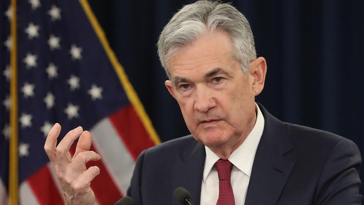 Federal Reserve Board Chairman Jerome H. Powell speaks during a news conference on Dec. 19 in Washington.