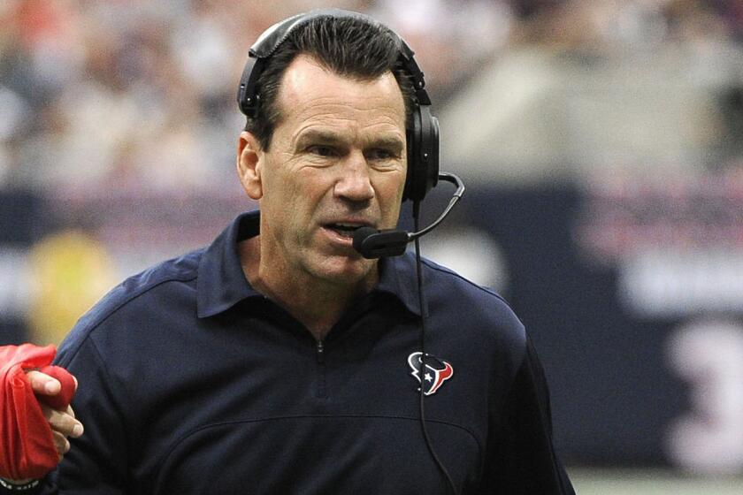 Gary Kubiak challenges a ruling on the field during the Houston Texans' game against the Tennessee Titans on Sept. 30, 2012.