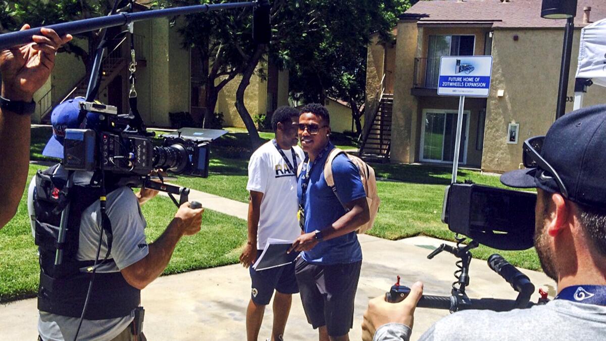 Rookie wide receiver Pharoh Cooper checks into Rams training camp at UC Irvine on Wednesday.
