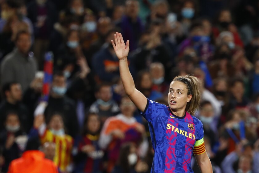 FILE - Barcelona's Alexia Putellas celebrates after scoring against Real Madrid during the Women's Champions League quarter final, second leg soccer match between Barcelona and Real Madrid at Camp Nou stadium in Barcelona, Spain, Wednesday, March 30, 2022. Putellas will lead Spain's squad at the women's European Championship in England next month. Putellas is the highlight of the 23-player list announced by coach Jorge Vilda on Monday, June 27, 2022. (AP Photo/Joan Monfort, File)