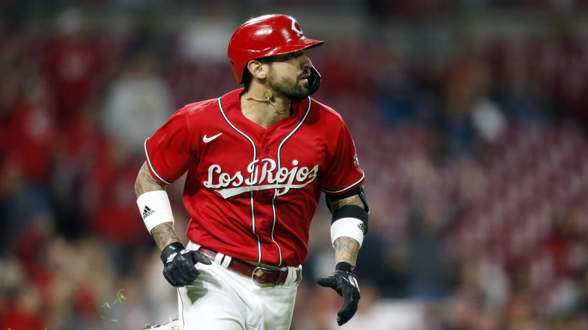 Cincinnati Reds outfielder Nick Castellanos runs.