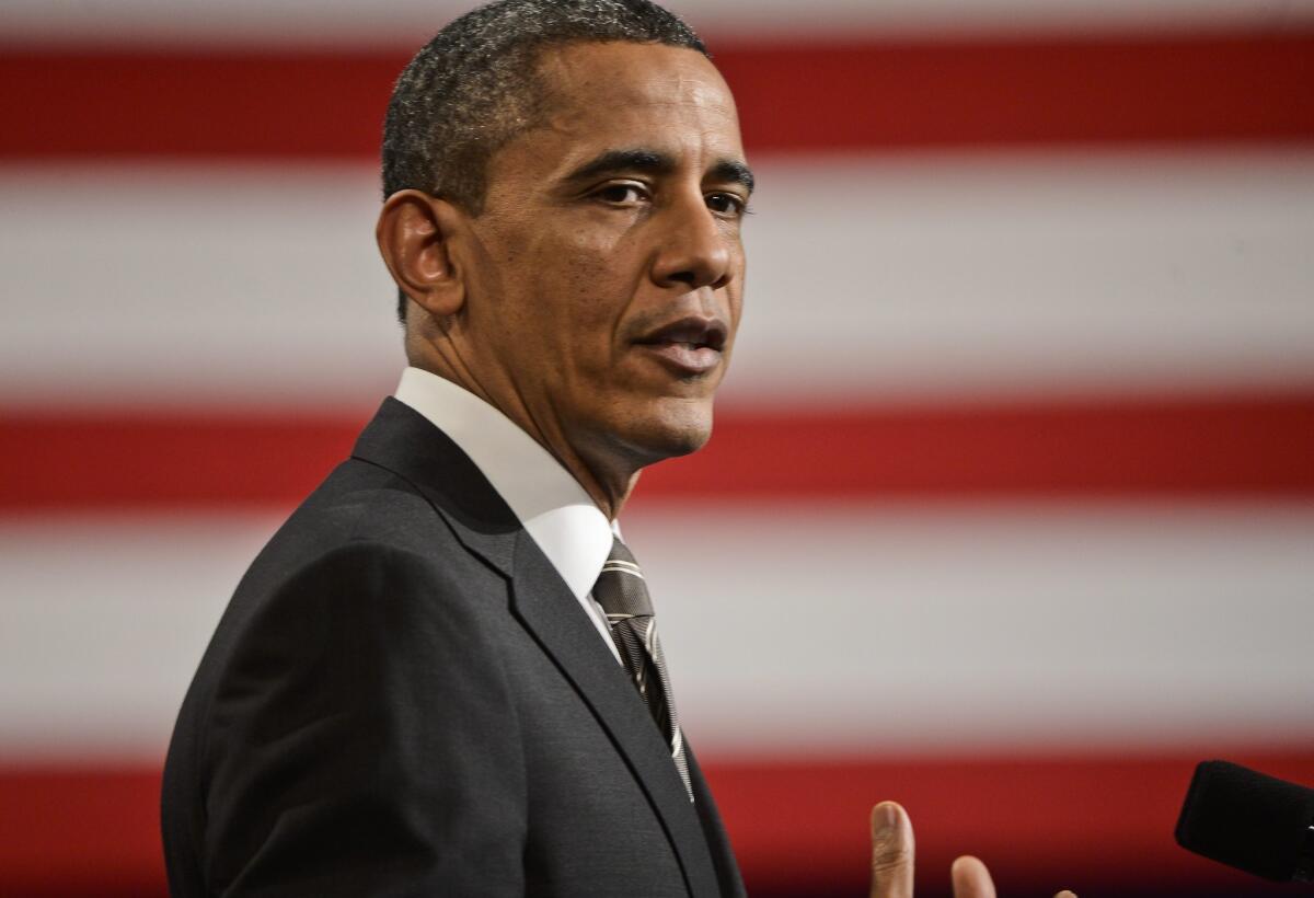 President Obama speaks at Hyde Park Academy in Chicago, Ill. Obama is calling for a raise to the federal minimum wage, job training and marriage for low income families on his post State of the Union tour promoting his "ladders of opportunity" initiative.