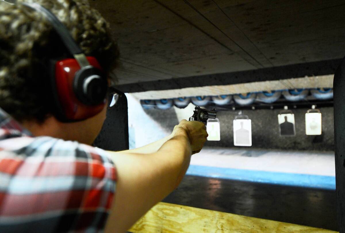 A shooter uses his Smith & Wesson handgun at the Los Angele Gun Club.