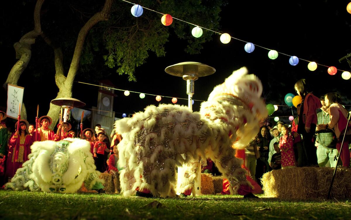 Traditional Vietnamese lion dancers perform in the Vietnamese Village of the 2012 Tet Festival of Southern California.