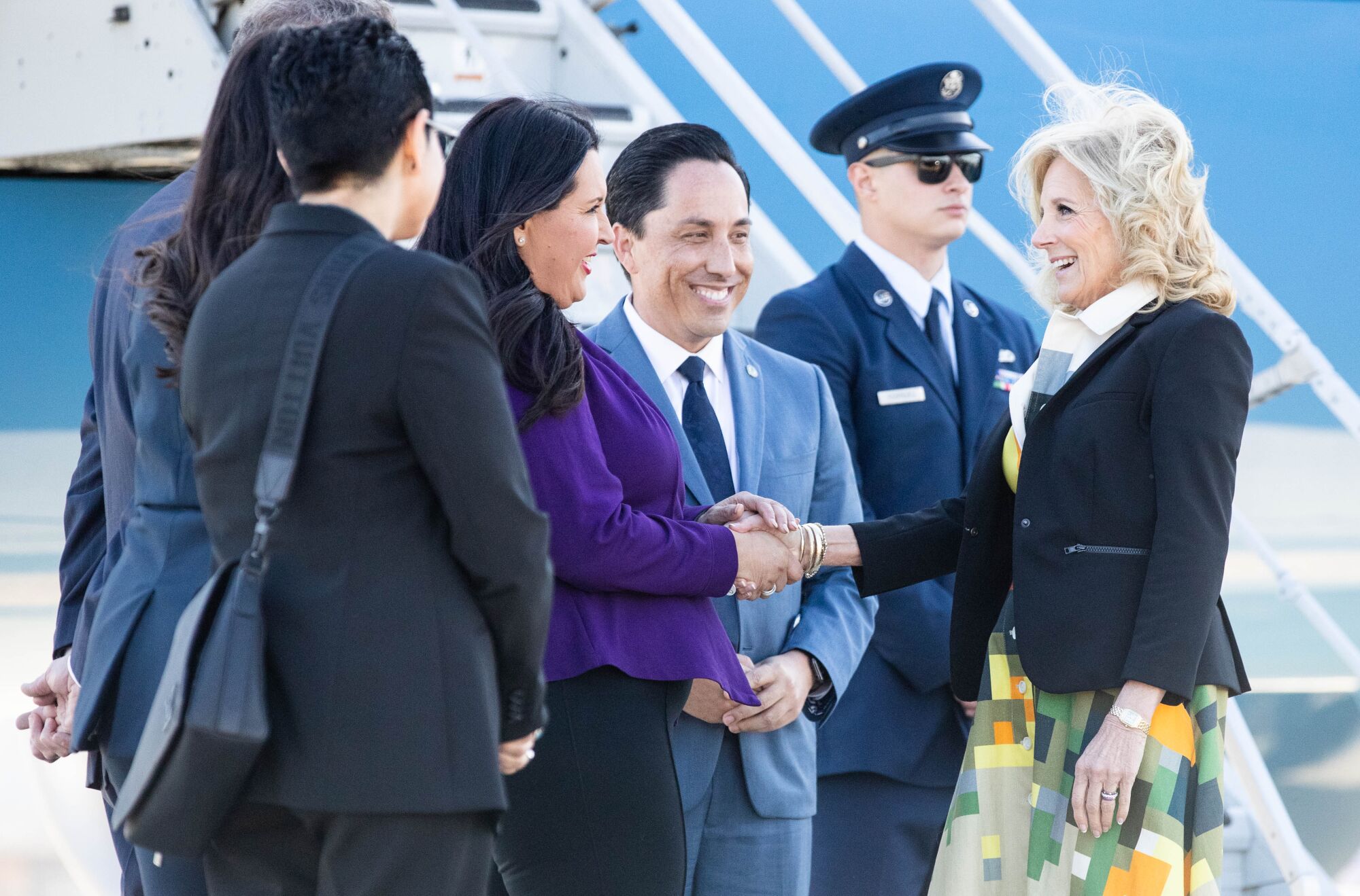 First Lady Dr. Jill Biden is greeted by mayor Todd Gloria and Chair of the San Diego County Board of Supervisors Nora Vargas.
